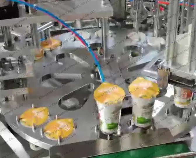 Rotary Yogurt Cup Filling Sealing Machine 12 Rotary double yogurt cup filling and sealing machine
