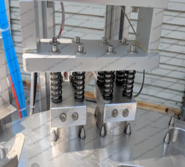 Rotary Yogurt Cup Filling Sealing Machine 8 Sealing system
